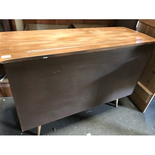 41 - A mid century Ercol Windsor blonde wood beech and elm sideboard in excellent condition, with cutlery... 