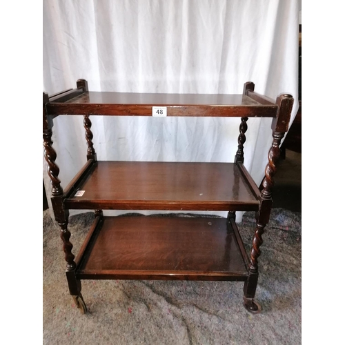 48 - An Edwardian oak barley twist three tier tea/side trolley; a carver dining chair with wavy ladder ba... 