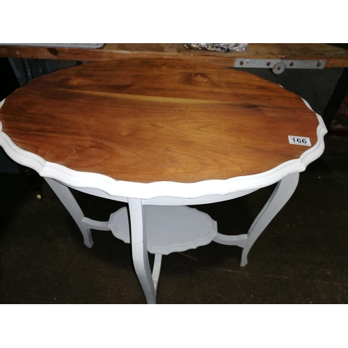 56 - An oval conservatory/hall table with painted base, H71, L71cm