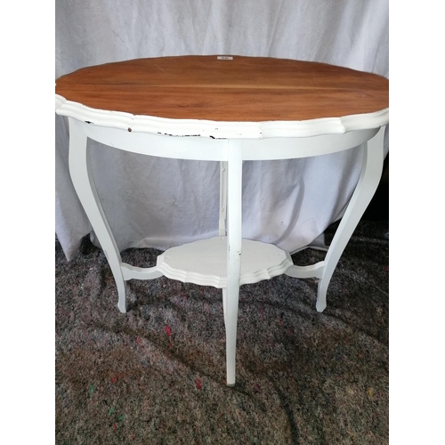 56 - An oval conservatory/hall table with painted base, H71, L71cm