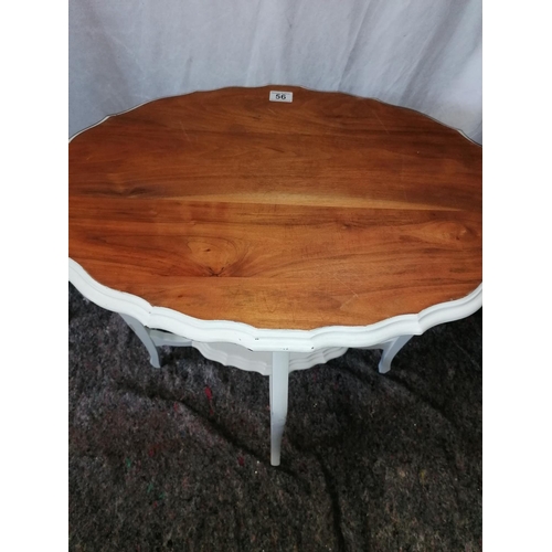 56 - An oval conservatory/hall table with painted base, H71, L71cm