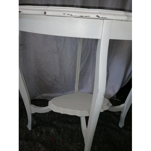 56 - An oval conservatory/hall table with painted base, H71, L71cm