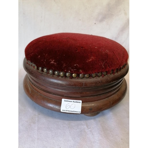 60 - An unusual piece - an antique mahogany footstool/ashtray upholstered in red velvet, having a lift-up... 