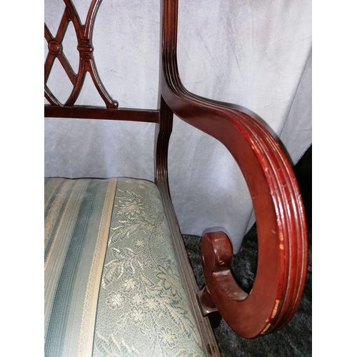 63 - A set of five reproduction dining chairs, including one carver with scroll arms, fretwork seat backs... 