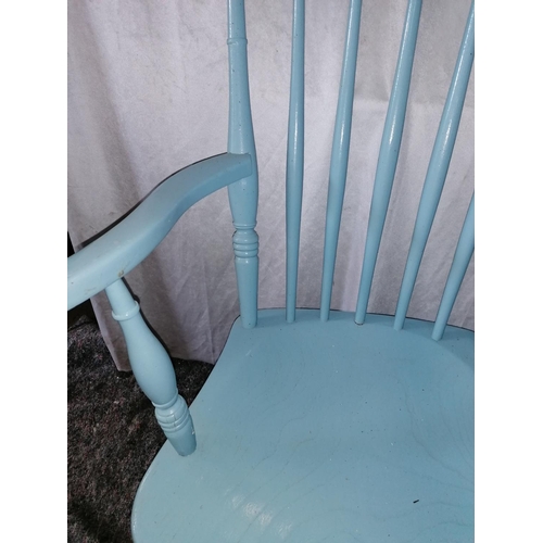 72 - A set of four sturdy old Windsor kitchen chairs (one carver), painted in a cornflower blue, good con... 