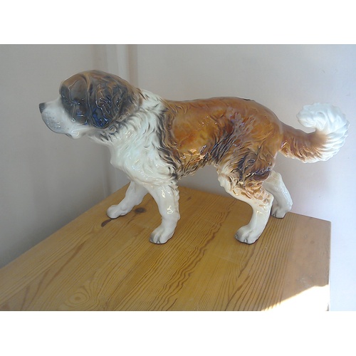 86 - A large German porcelain St Bernard dog figurine made by GOEBEL Manufactory, height 28cm