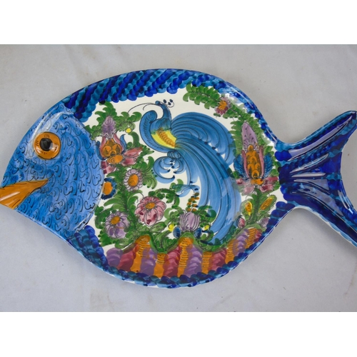 101 - A collection of Continental painted ceramic plates, jugs etc - fruit and fish themed