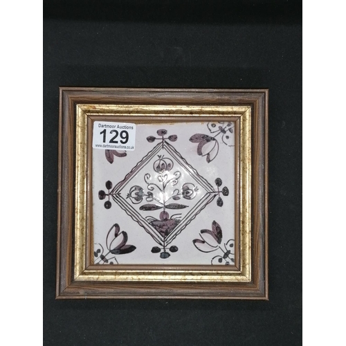 129 - Three framed antique brown floral manganese Delft tiles