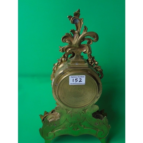 152 - A pretty ormulu mantel clock in Rococo style, H38cm, age and maker unknown, with key a/f