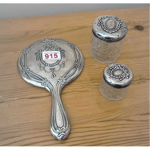 183 - Antique silver dressing table items: a very pretty silver backed hand mirror with swags and bows des... 