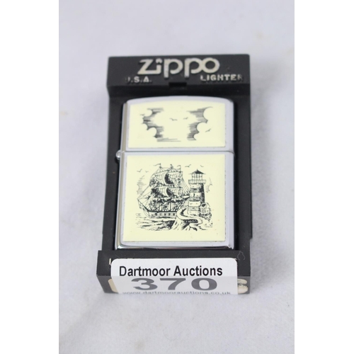 222 - A Zippo lighter in original box and with paperwork