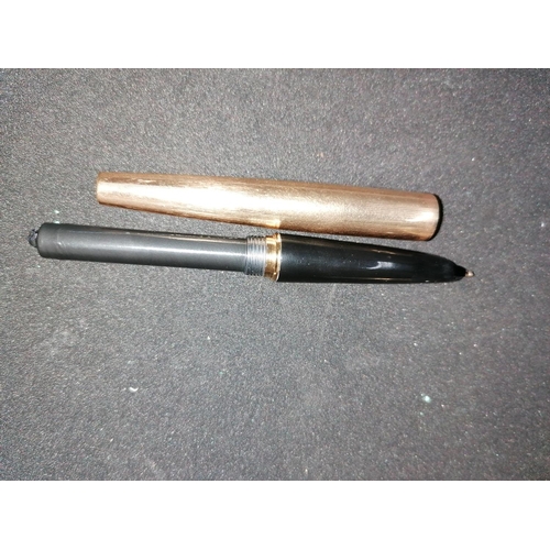 225 - A vintage fountain pen: gold and black Parker, made in US. Untested as ink barrel not functioning. A... 