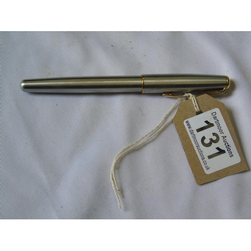 226 - A vintage fountain pen: a silver and black Parker Sonnet, gold nib, made in France, working order