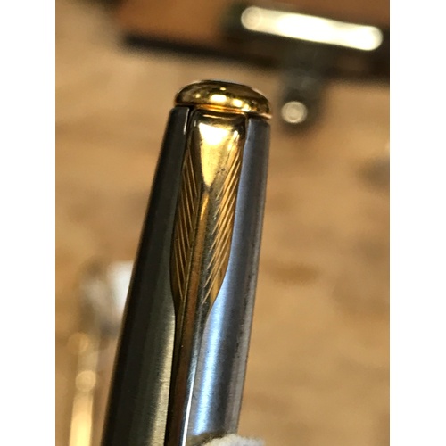 226 - A vintage fountain pen: a silver and black Parker Sonnet, gold nib, made in France, working order