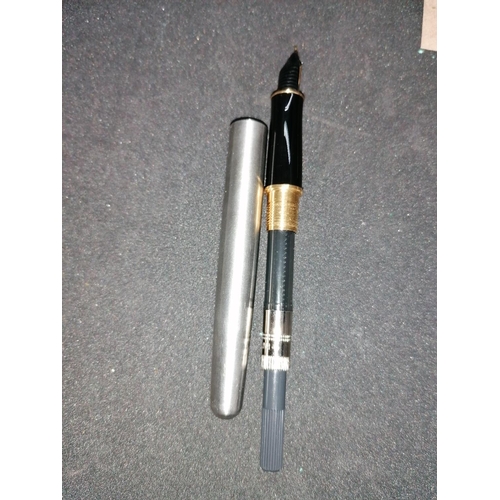 226 - A vintage fountain pen: a silver and black Parker Sonnet, gold nib, made in France, working order