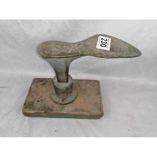 230 - A rare bronze shoe last on wooden stand