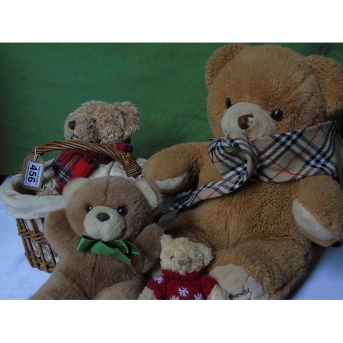 238 - A Burberry gentleman's tie and four SW1 teddy bears from Harrods and Hamleys