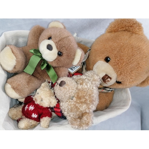 238 - A Burberry gentleman's tie and four SW1 teddy bears from Harrods and Hamleys