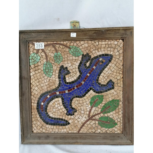 283 - A mosaic of a lizard in a weathered old frame