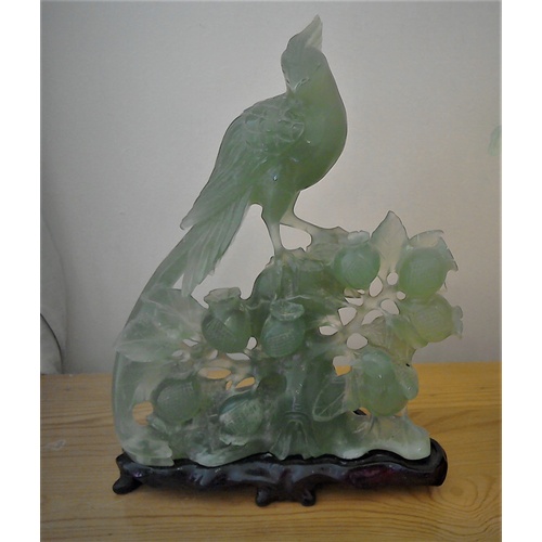 324 - A vintage/antique Chinese green jade or nephrite jade? figurine of a bird of paradise, with carved w... 