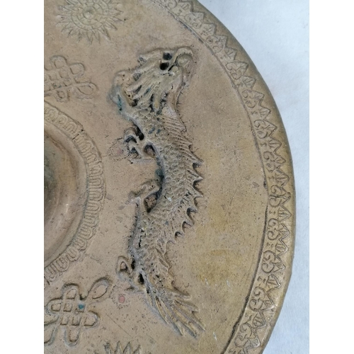 326 - A Chinese three dragon brass gong on a stand