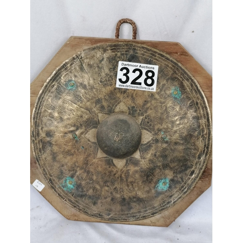 328 - A mounted bronze oriental shield