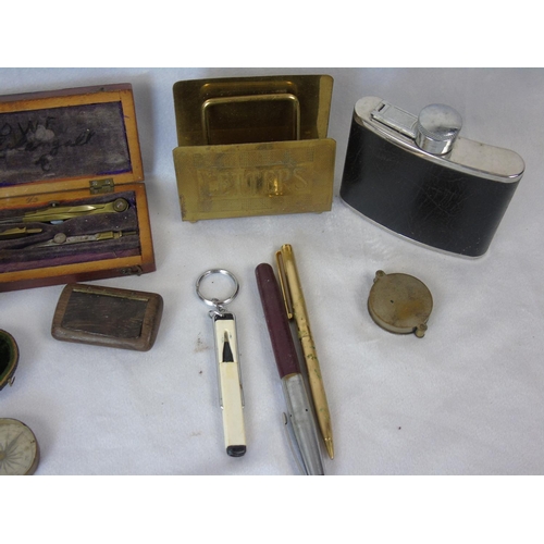 337 - A miscellany of vintage items including a small metal trunk, cash/deeds tin, a letter rack, a compas... 