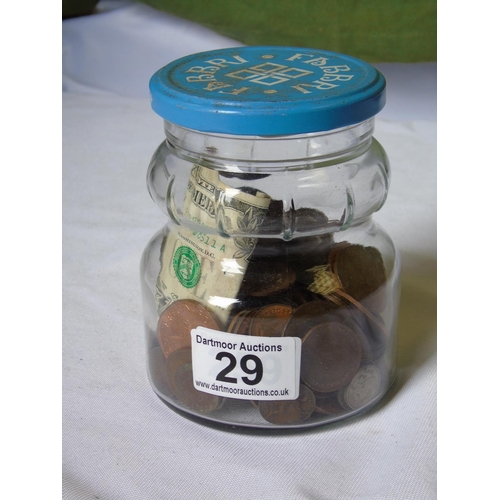 369 - A collection of 20C coins in a jar and a dollar bill