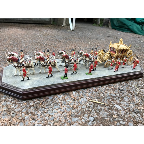 263 - Three Royal memorabilia models; a superb Enesco Ray Ayres Border Fine Arts 24k Gold State Coach from... 