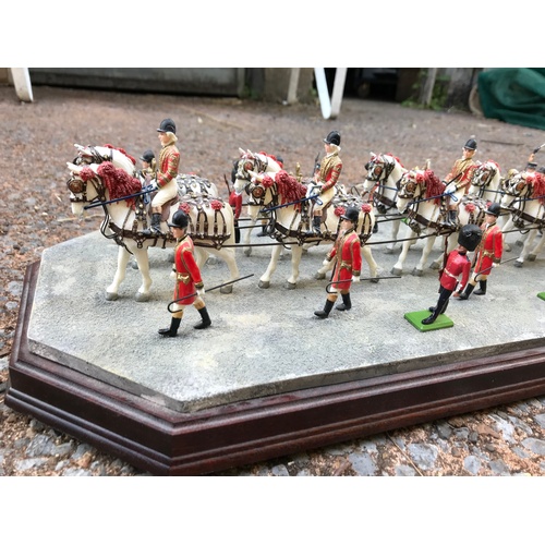 263 - Three Royal memorabilia models; a superb Enesco Ray Ayres Border Fine Arts 24k Gold State Coach from... 