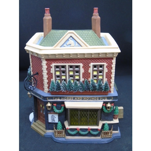 262 - Department 56 Dickens Village series, a collector's model of The Horse and Hounds English pub, in or... 