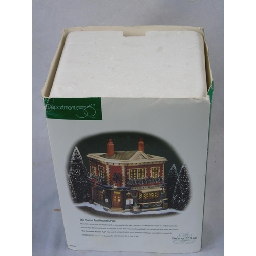 262 - Department 56 Dickens Village series, a collector's model of The Horse and Hounds English pub, in or... 