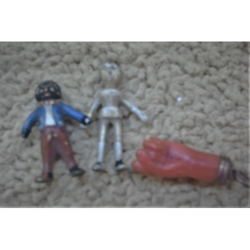 246 - Three miniature collectibles - a 19C toy figure of a wooden doll holding hands with a golliwog, 2cm ... 