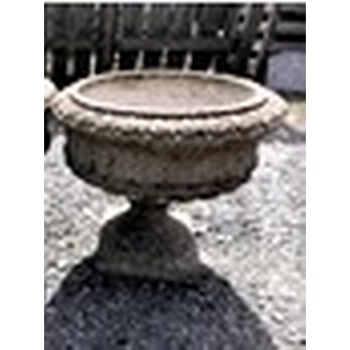 22 - An old and weathered garden urn