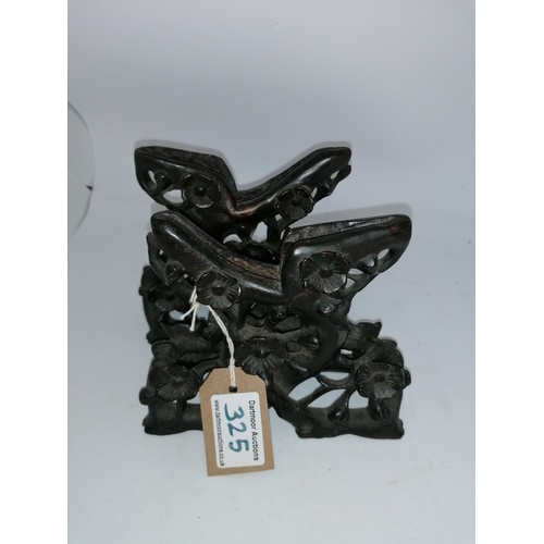 325 - A pair of antique Japanese carved wooden stands