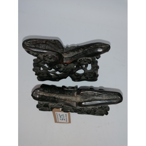 325 - A pair of antique Japanese carved wooden stands