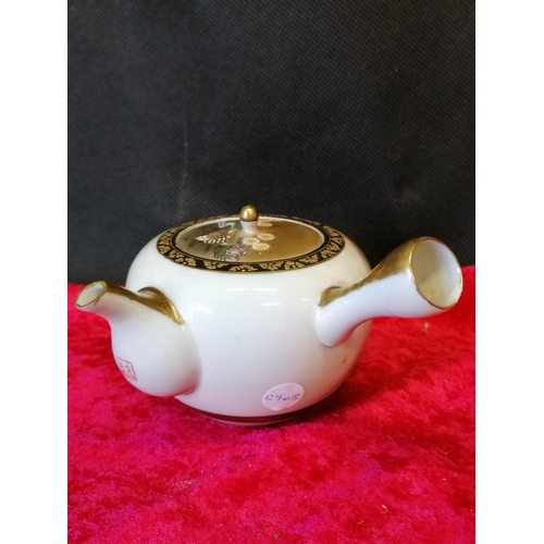 54 - A small antique satsuma tea pot