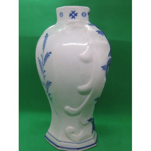 113 - Two Delft blue baluster-shaped chimney vases one decorated with a mill race,the other a river landsc... 