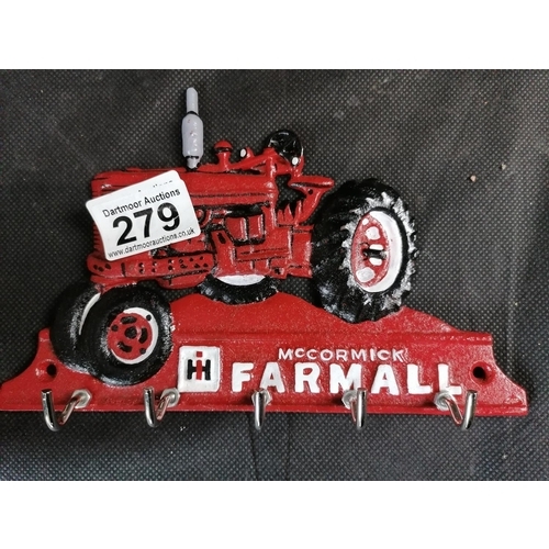 279 - Cast iron Farmall tractor wall hooks
