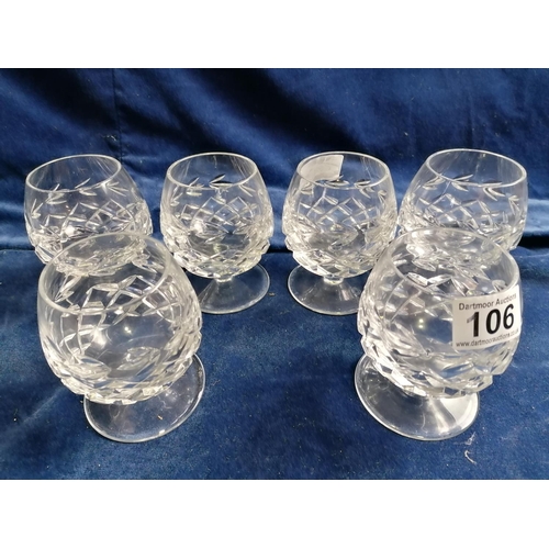 106 - A set of 6 heavy brandy glasses with faceted sides