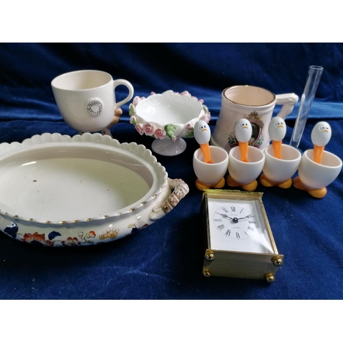 245 - An Estyma Quartz battery operated carriage clock; also items of novelty tableware etc