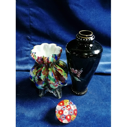 71 - An attractive Victorian baluster shaped glass chimney vase brightly painted with a butterfly amongst... 