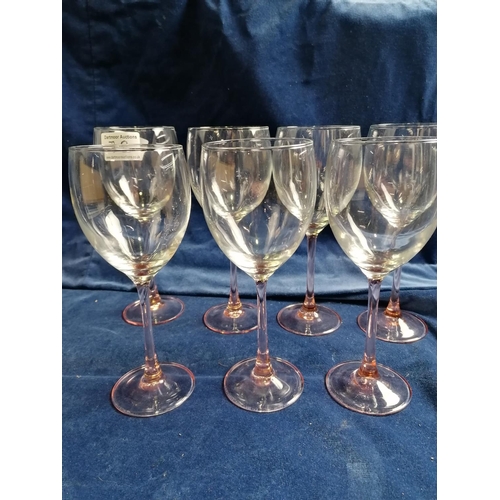 72 - A set of six Luminarc large wine glasses,with pink flashed stems