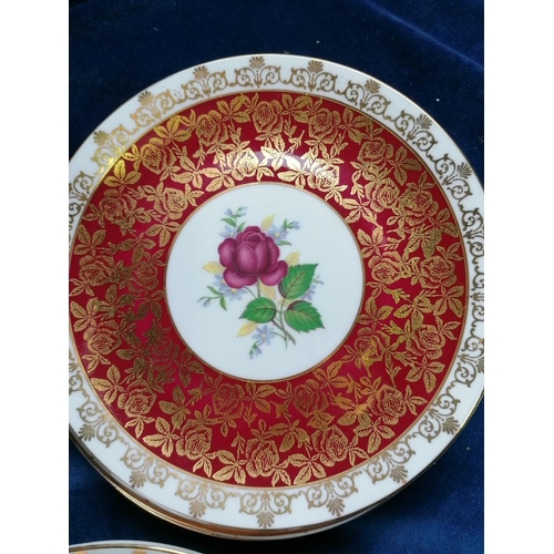 77 - A decorative Windsor tea service, the circular outlines, profusely gilded with flowers, conforming d... 