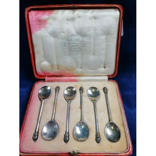 260 - A boxed set of six Arts and Crafts silver coffee spoons each with bud terminal, Sheffield 1938, by T... 
