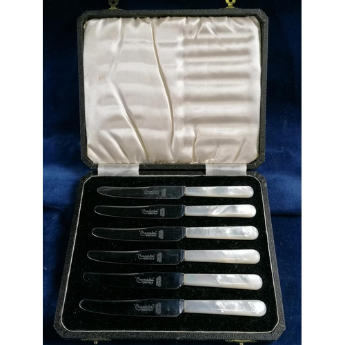 264 - A boxed pair of EP pickle forks also a boxed set of 6 tea knives with MOP handles