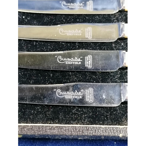 264 - A boxed pair of EP pickle forks also a boxed set of 6 tea knives with MOP handles