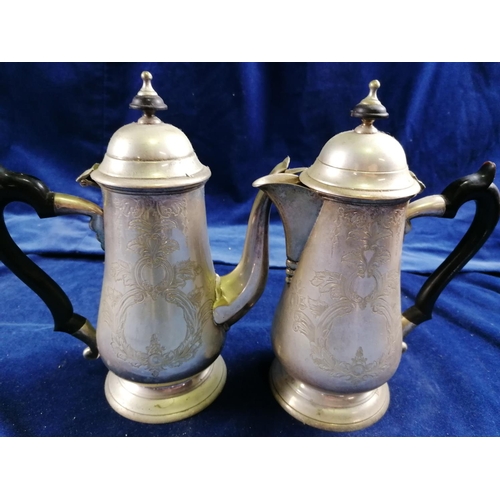 265 - A pair of EP cafe au lait pots of George I style, 23 cm over spout