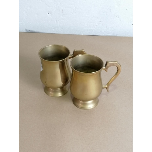 27 - Pair of Small Brass Beer Mugs.