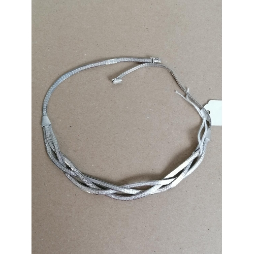 141 - A silver 3 strand necklace